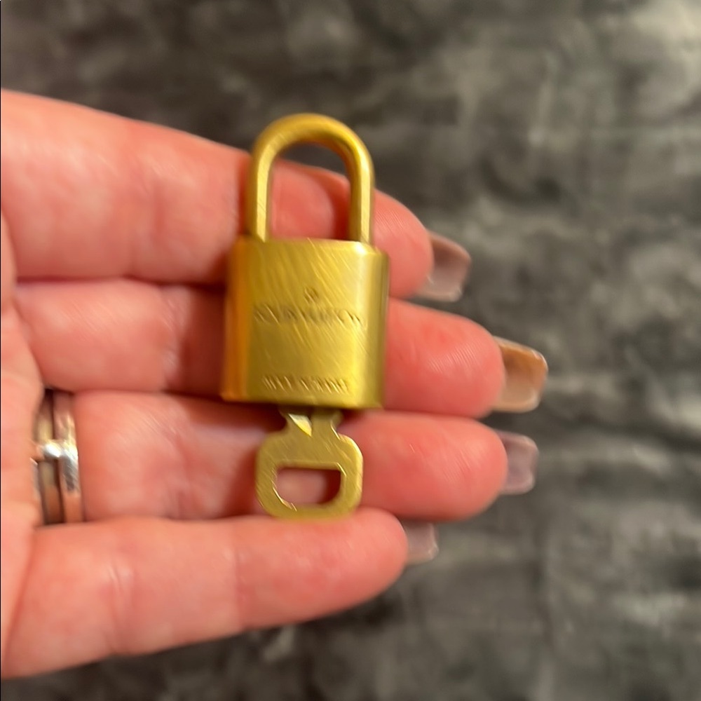 Louis Vuitton Gold Key Holder